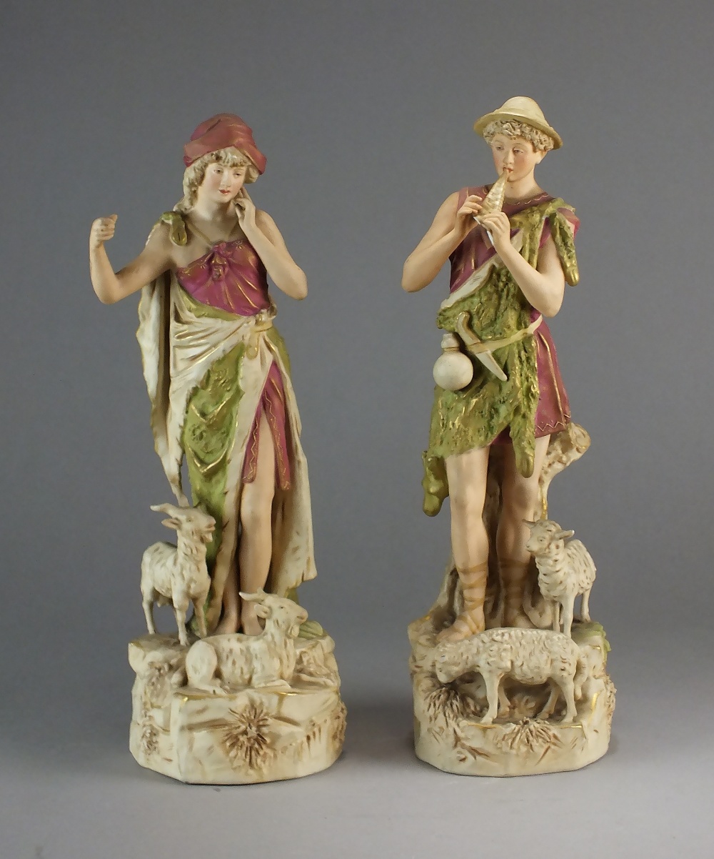 A pair of early 20th century Royal Dux figures of a shepherd and female goatherd, - Bild 2 aus 2
