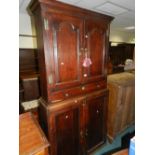 A George III and later oak cabinet,