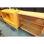 An Avalon Yatton light oak glazed sliding door bookcase, 91cm wide, 23cm deep,