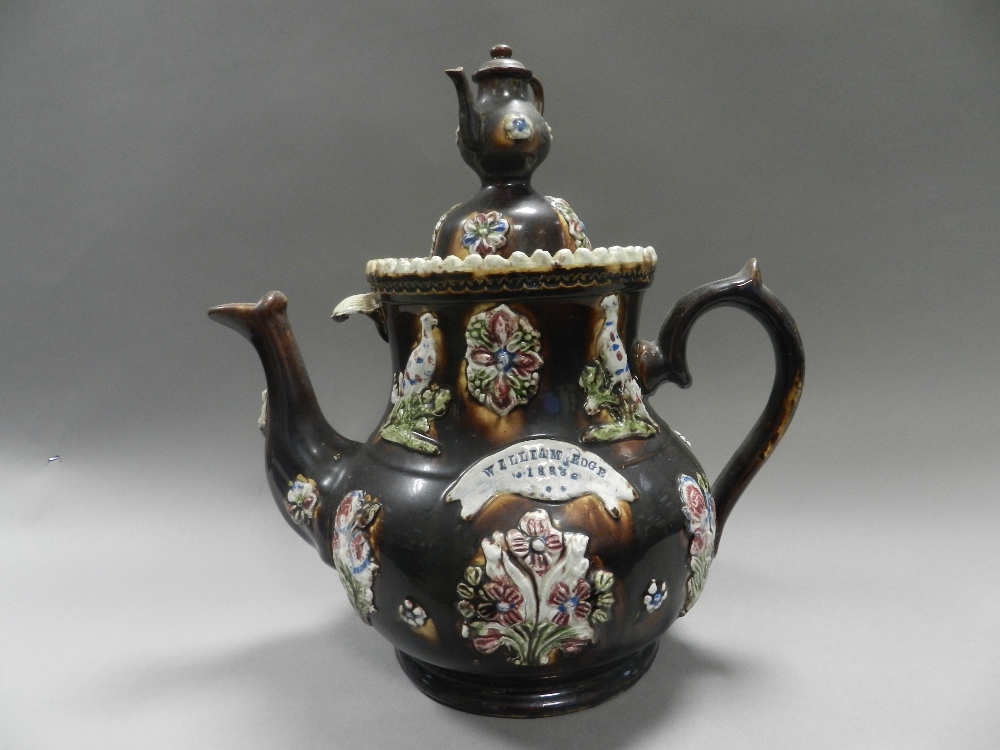 A large dated Measham barge ware teapot and cover