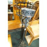Two wrought iron plant stands, approx.