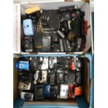 Two boxes of cameras