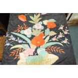An Indian silk work panel embroidered with bright flowers and lame thread work, approx.