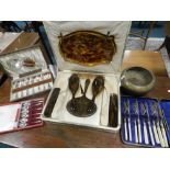 A cased set of six silver spoons, together with a collection of plated flatware,