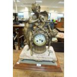 A French gilt spelter figural mantle clock with 3 inch white enamel dial and Arabic numerals,