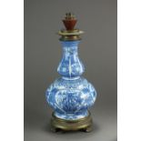A late 19th century English pearlware blue and white lamp base,