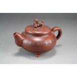A Chinese yixing stoneware teapot and cover, late Qing/Republic period,