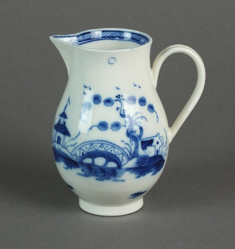 A Caughley sparrow beak jug painted with the Bridge and Windmill pattern, circa 1785-92, S mark, 9.