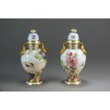A pair of rare Coalport vases and covers painted with flowers, butterflies and birds, circa 1875-81,