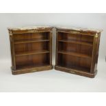 A pair of French marble ormolu mounted and walnut open bookcases, 19th century,