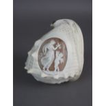 A Victorian conch shell cameo, Italian, 19th century, carved depicting Venus and Cupid,