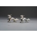 A pair of Chinese silver dragon menu or place holders, circa 1900, unsigned,