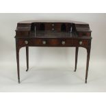 An Edwardian mahogany desk, early 20th century, in Carlton House style,