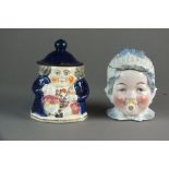 A group of tobacco jars and covers, comprising four early 20th century glazed examples,