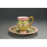 A Coalport cabinet cup and saucer, circa 1890-90,