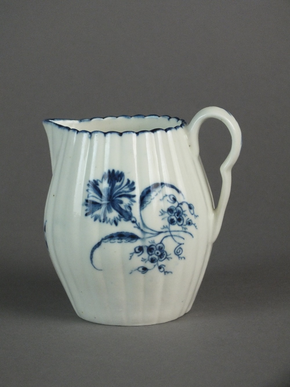 A Caughley milk jug painted with the Gillyflower I pattern, circa 1775-80, C mark, 9.