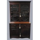 An early 19th century mahogany high secretaire bookcase,