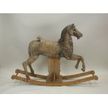 A Victorian/ Edwardian pine carousel horse, late 19th/early 20th century with restorations,