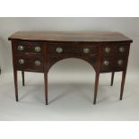A George III mahogany and boxwood strung bowfront sideboard,