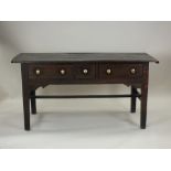 A joined oak table, early 18th century and later,