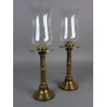 A pair of Danish Megaline brass paraffin storm lamps, 20th century,