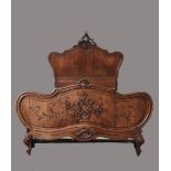 A Louis XV style walnut double bed, 19th century,