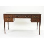 An early 20th century mahogany serpentine dressing table,