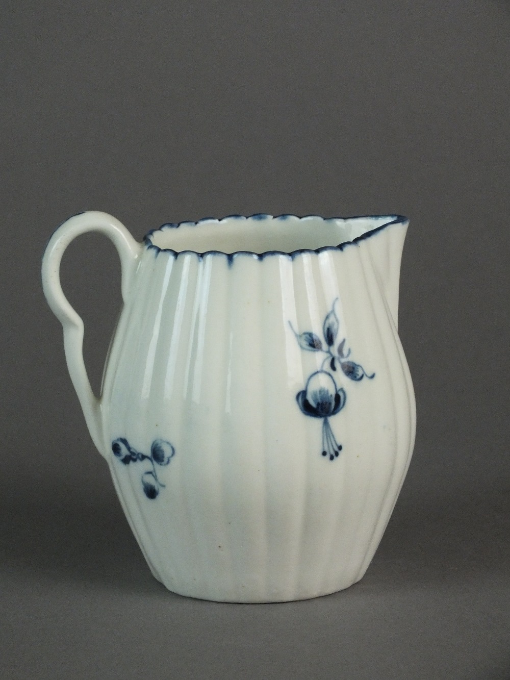 A Caughley milk jug painted with the Gillyflower I pattern, circa 1775-80, C mark, 9. - Image 2 of 4