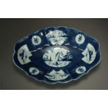 A Caughley powder blue oval form dessert dish painted with the Fan Panelled landscape design,