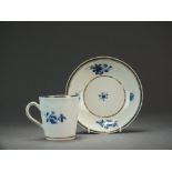 A Caughley coffee can and saucer painted with the Salopian Sprig pattern with additional gilding,