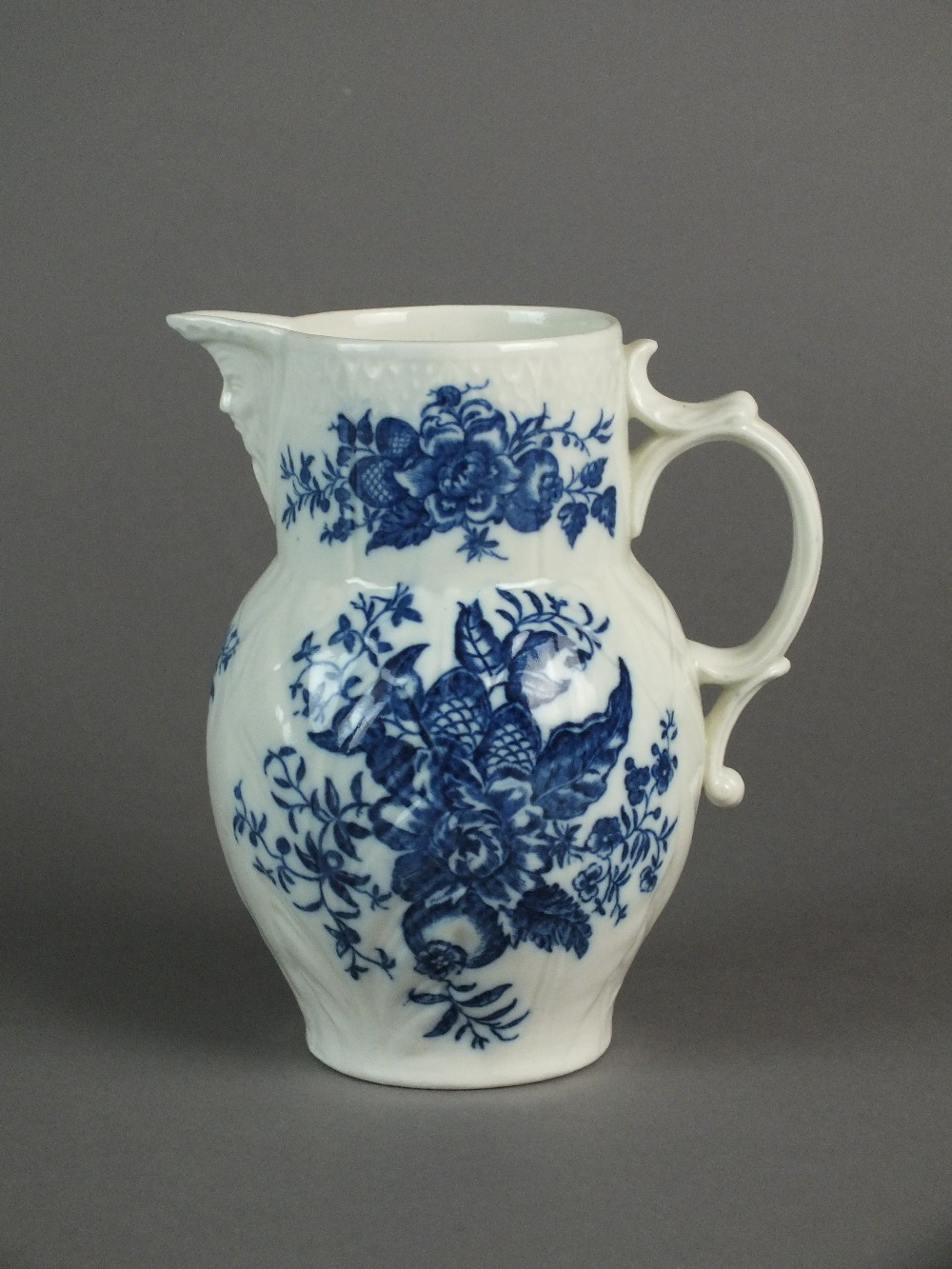 A Caughley mask head jug transfer-printed with the Pine Cone pattern, circa 1785-92, S mark, 14. - Image 2 of 4