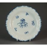 A Caughley plate transfer-printed in the Gillyflower II pattern within a wavy feathered rim border,