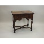 A figured walnut lowboy, William and Mary and later,