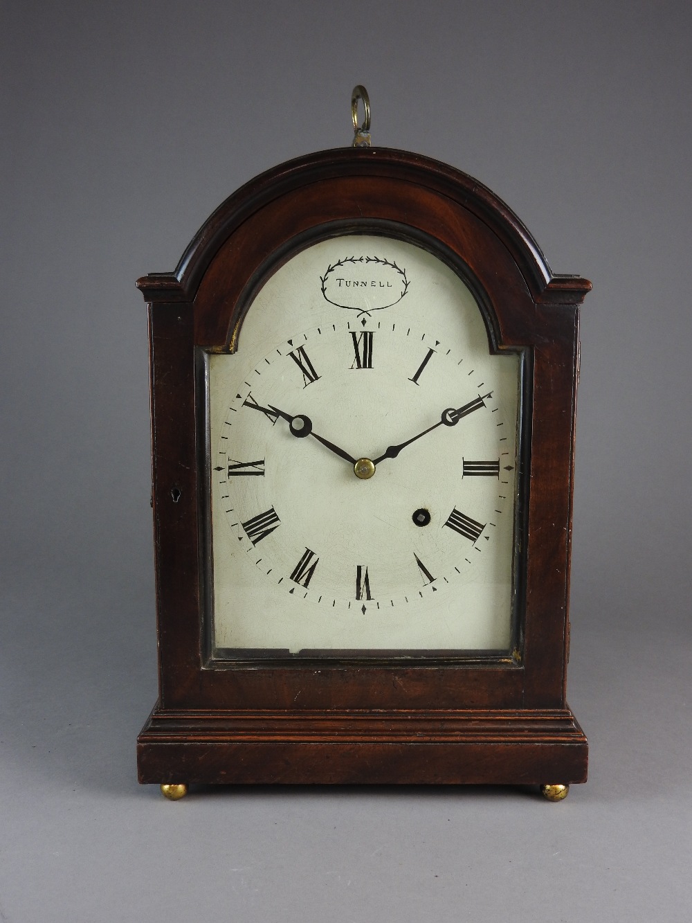 A mahogany dome top mantel timepiece, early 19th century,