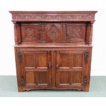 A late 17th century joined oak court / press cupboard,