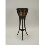 An Edwardian mahogany lined jardiniere or champagne bucket,