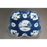 A Caughley powder blue square dessert dish painted with the Rock and House,