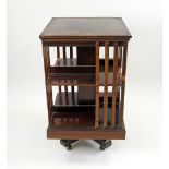 An Edwardian mahogany revolving low bookcase,