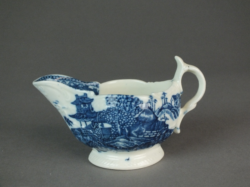 A Caughley cream or sauce boat transfer-printed with the Fenced Garden pattern, a very rare shape,