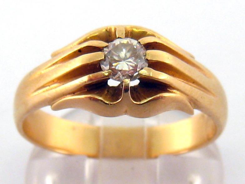 A single stone diamond ring, the gypsy set brilliant approx. 0.34 carat, the shank stamped '18k',