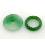 A jade bi, 2.8cm diameter, together with a ring (2)