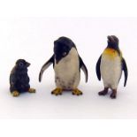 Three cold painted bronzes, two penguins and a chick. Tallest 4.5cm.