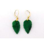 A pair of jade earrings, modelled as leaves, 2.7cm long, the hook fittings stamped '9k', 3.5gms