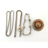 A mixed lot of white metal jewellery, including a brooch, two serpentine link necklaces, and a