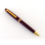 Montblanc Meisterstuck, a burgundy resin rollerball pen, no. XH1910441, no box or paperwork