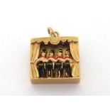 A 9 carat gold and enamel articulated charm, designed as a row of four can-can dancers, activated by
