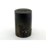 A Japanese bronze cylindrical container, the sides with different coloured metal appliques, the