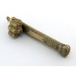 An Ottoman silvered brass scribe's penner, divit, with chased foliate decoration, 18.7 cm. long