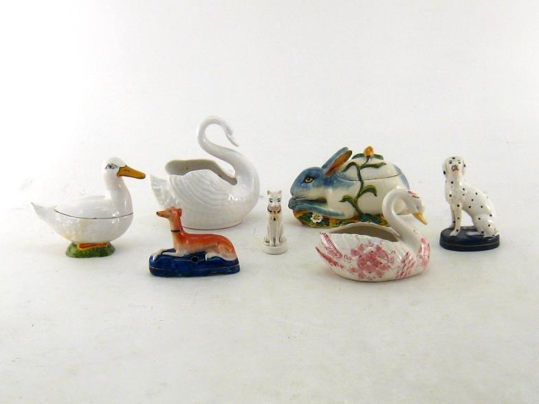 Six ceramic animal figures comprising two ceramic Staffordshire dogs, a greyhound and a Dalmatian,