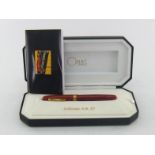 OMAS, 'Collezione A.M 87', a red briar wood fountain pen, with OBB nib and piston filler